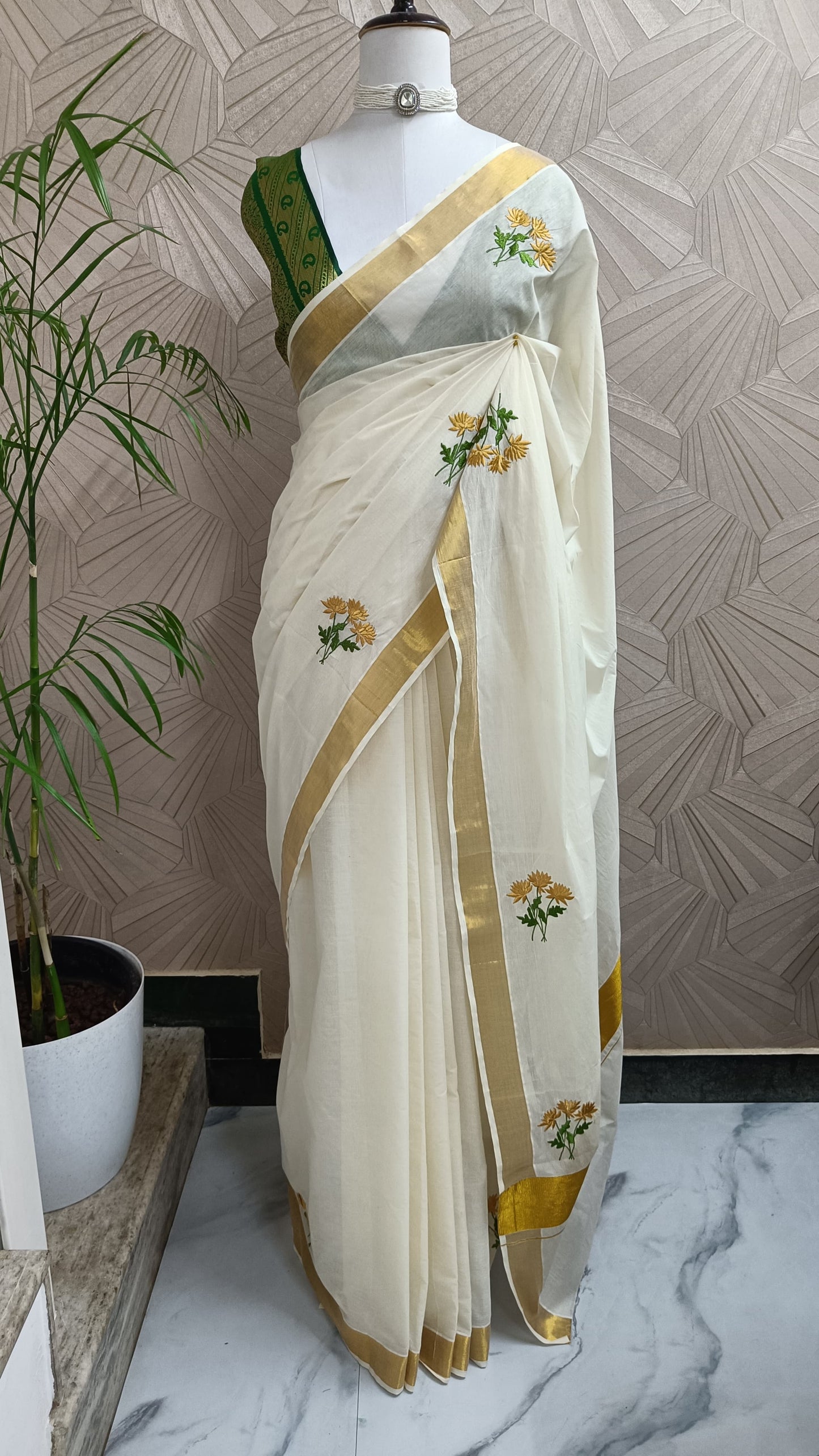 Classic Off-white Cotton Saree with Golden Border & Floral Embroidery