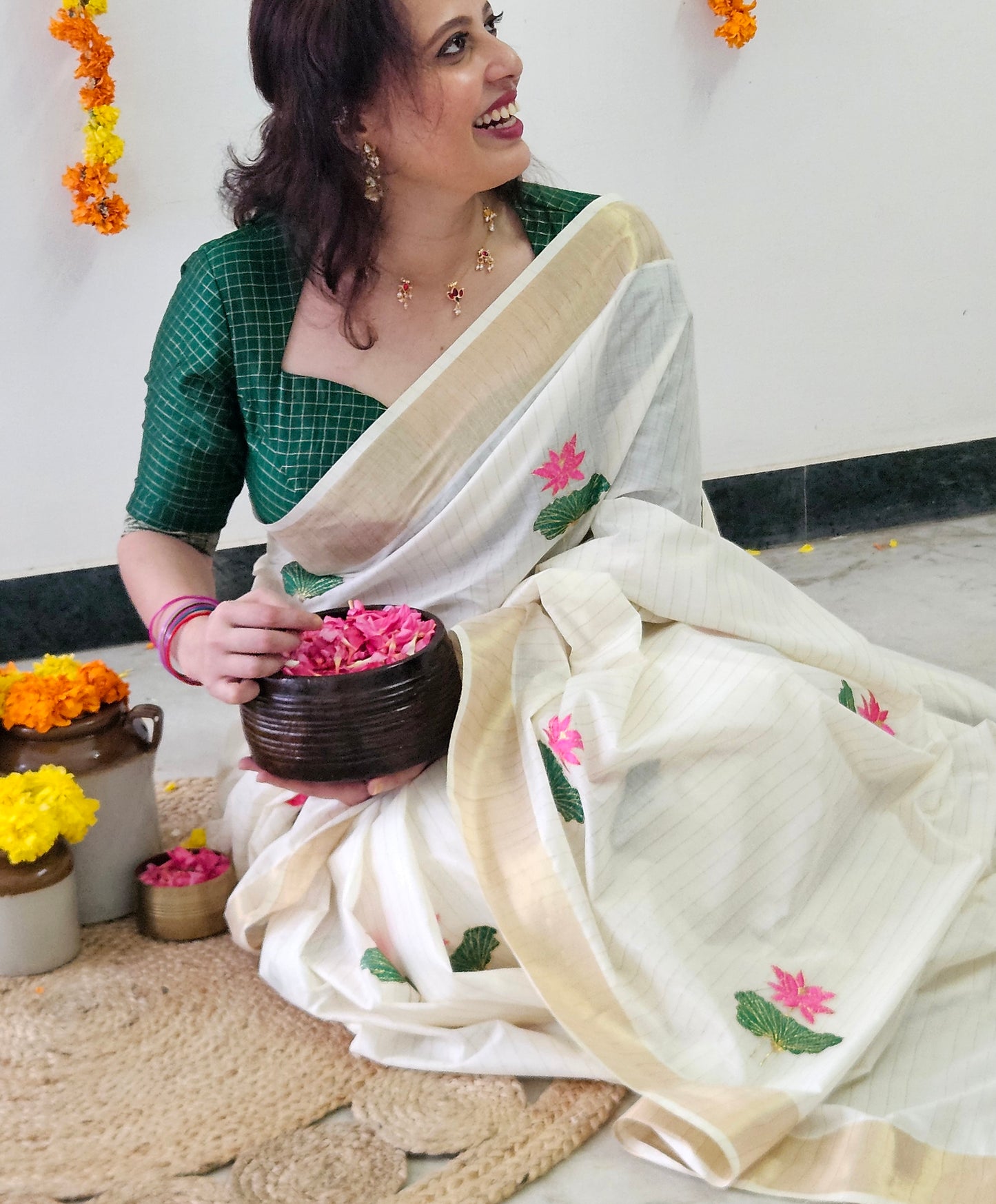 Kerala Kasavu Saree with Lotus Embroidery and Golden Stripes