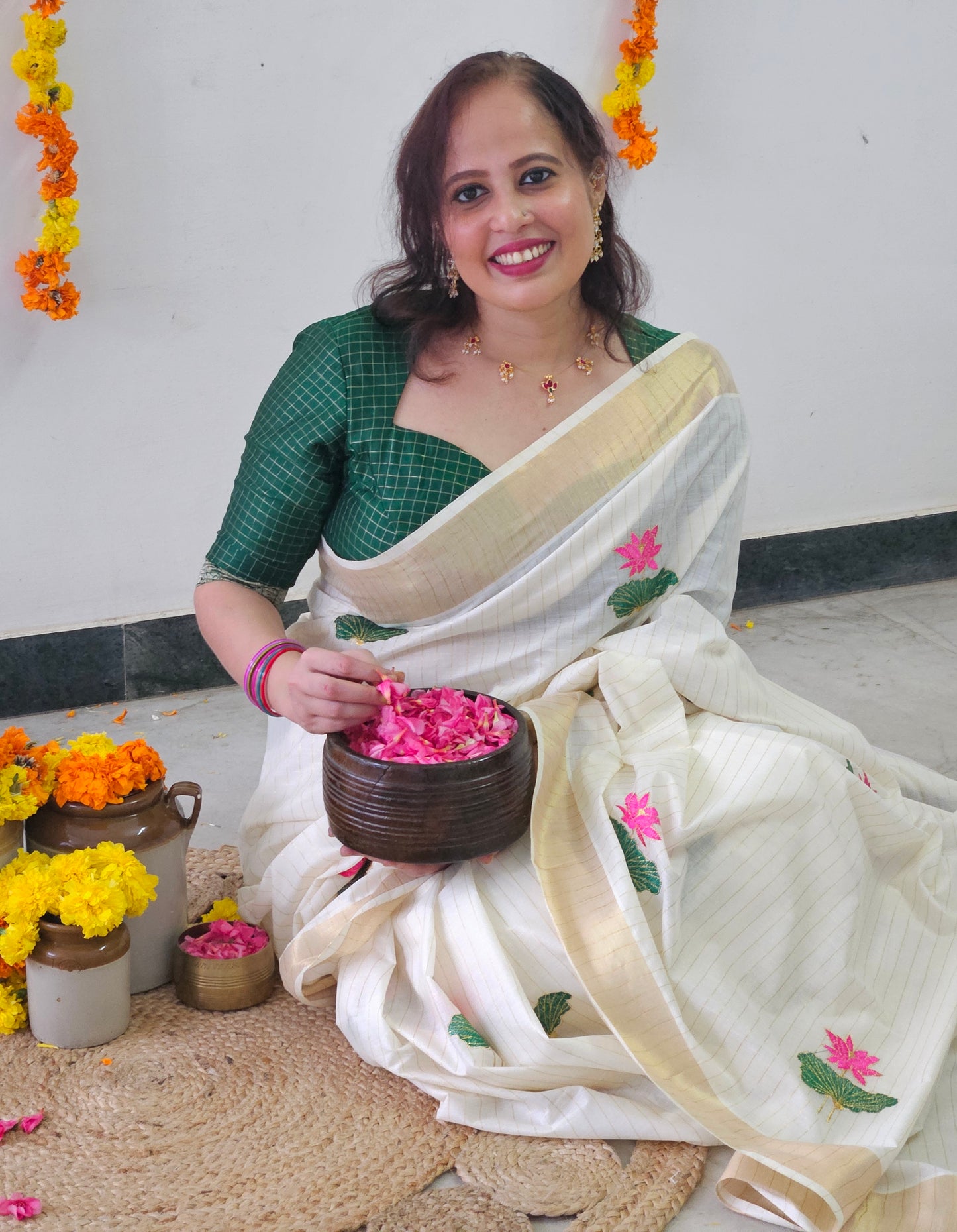 Kerala Kasavu Saree with Lotus Embroidery and Golden Stripes
