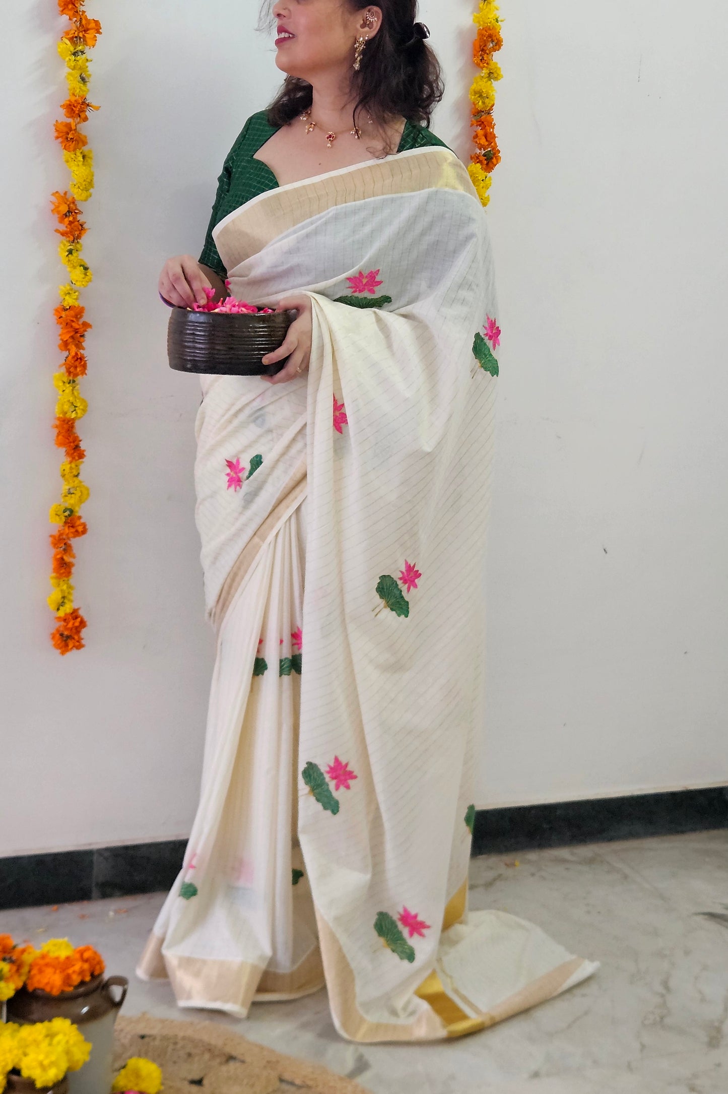 Kerala Kasavu Saree with Lotus Embroidery and Golden Stripes