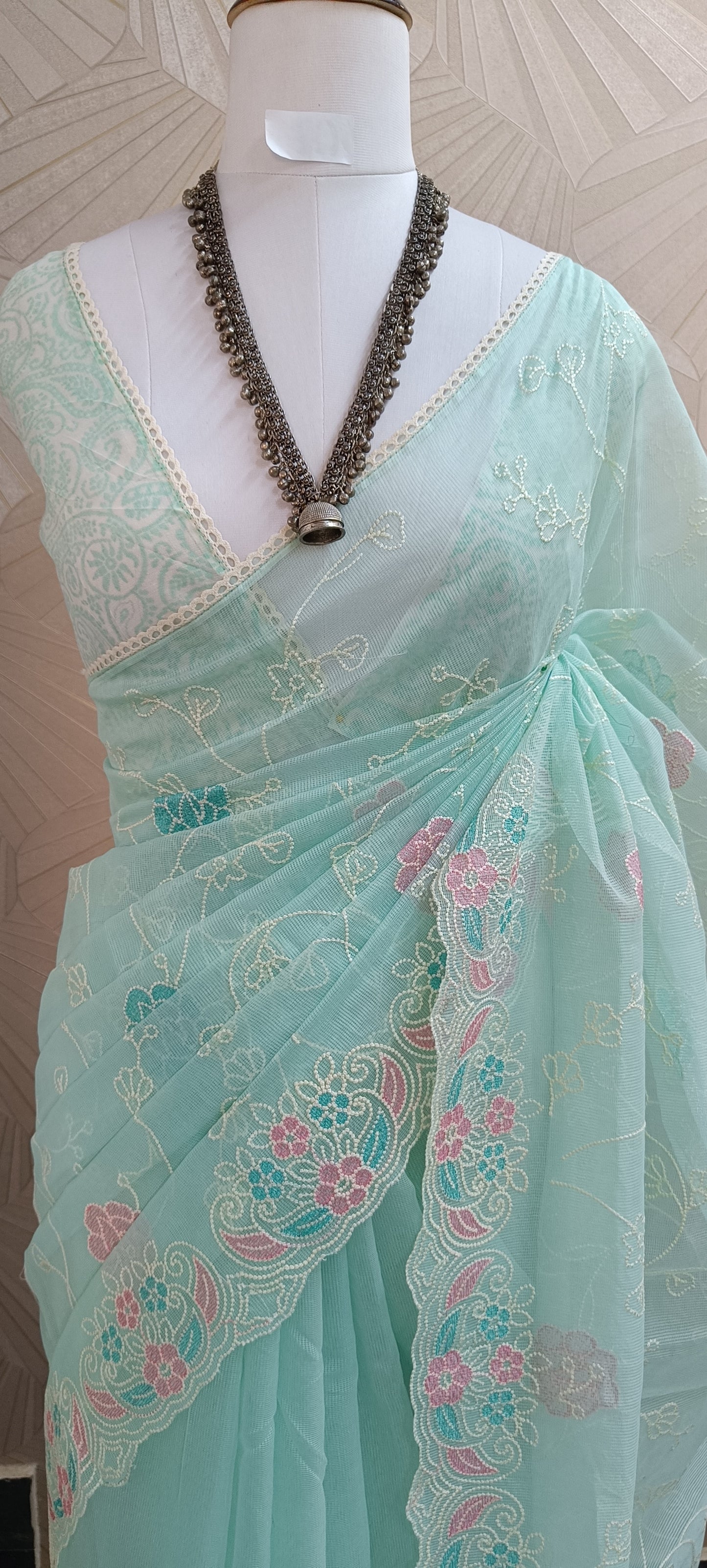 Pastel Embroidered Net Saree With Multicolor Floral Border