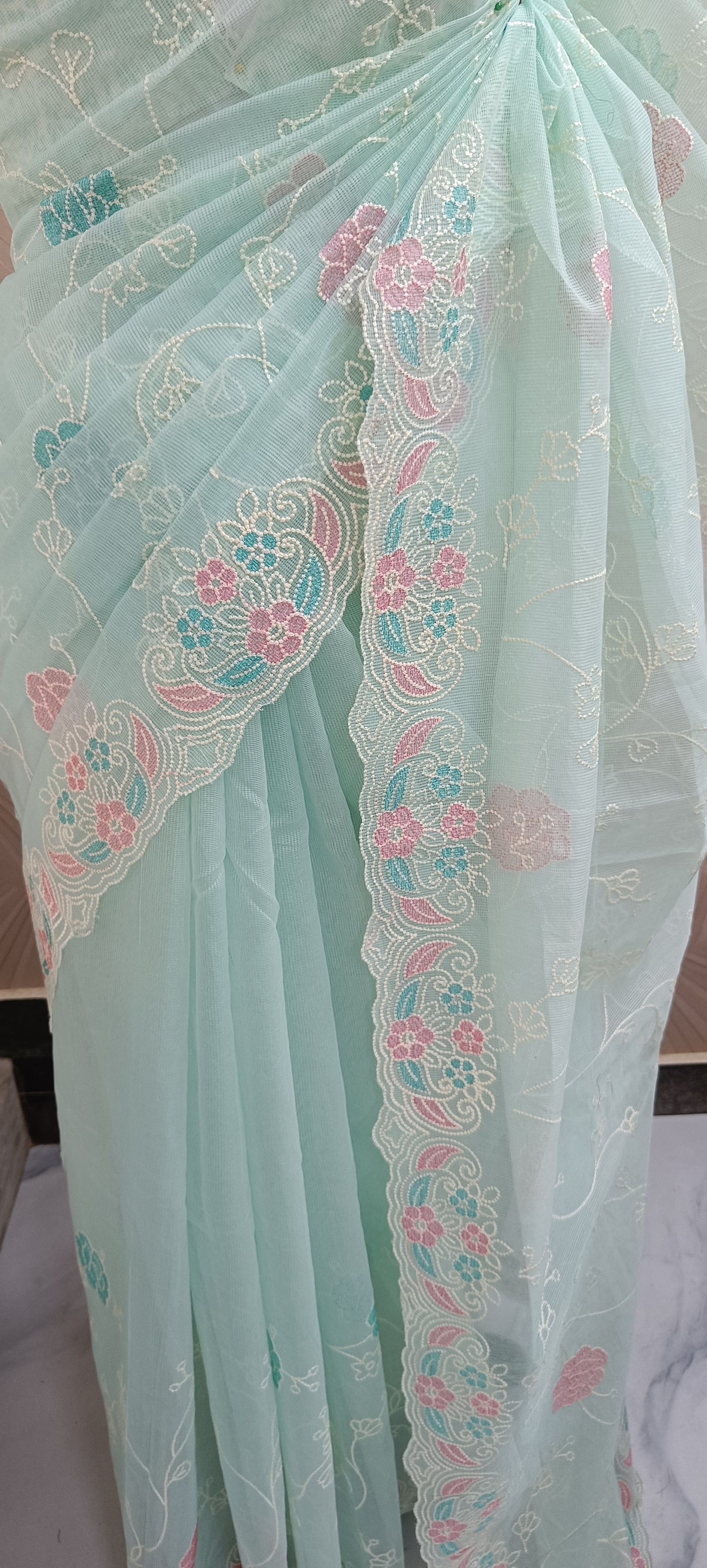 Pastel Embroidered Net Saree With Multicolor Floral Border