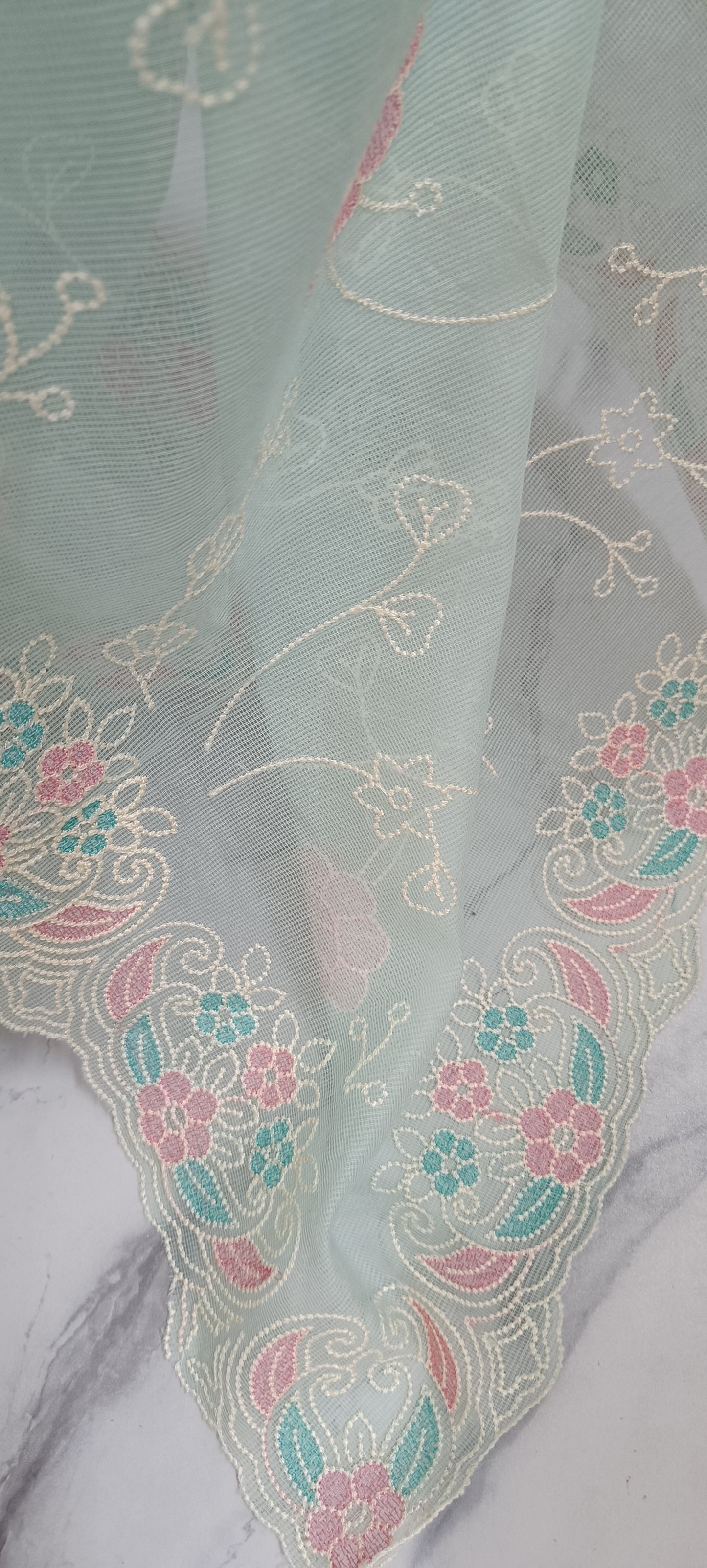 Pastel Embroidered Net Saree With Multicolor Floral Border