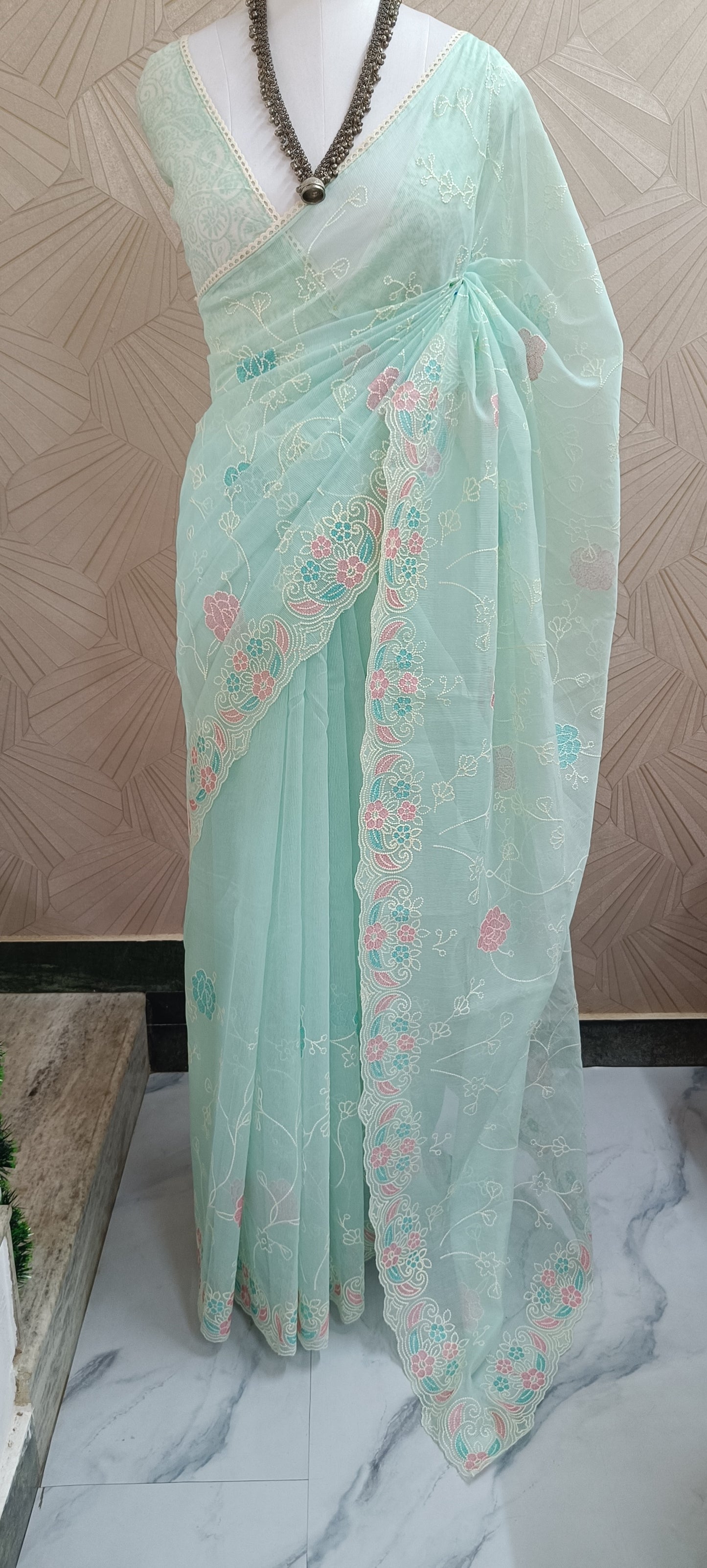 Pastel Embroidered Net Saree With Multicolor Floral Border