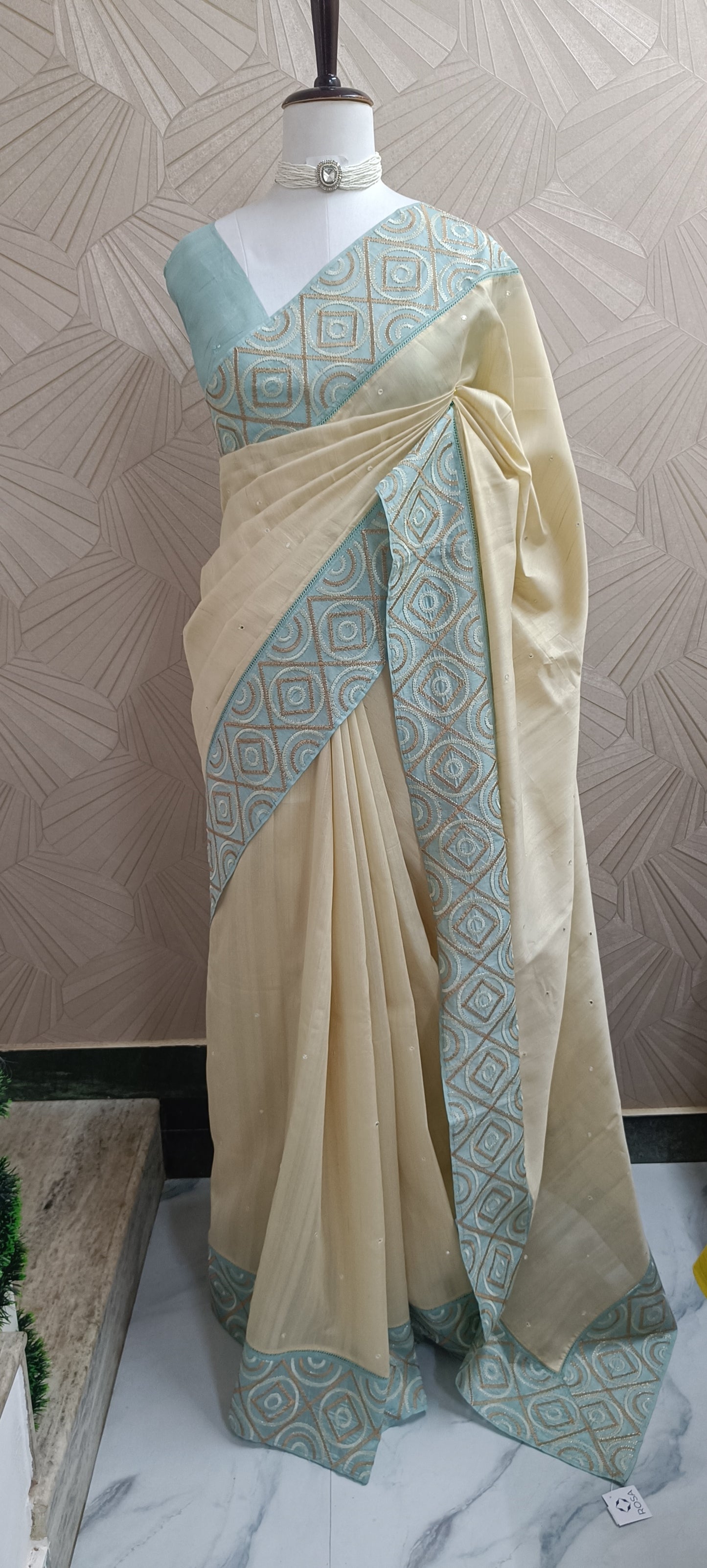 Beige Semi Tussar Saree With Aqua Blue Embroidered Border