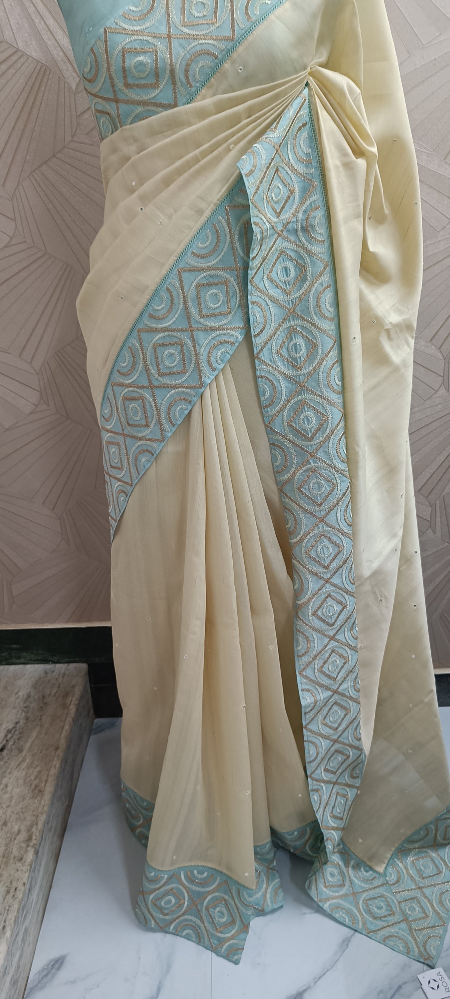 Beige Semi Tussar Saree With Aqua Blue Embroidered Border