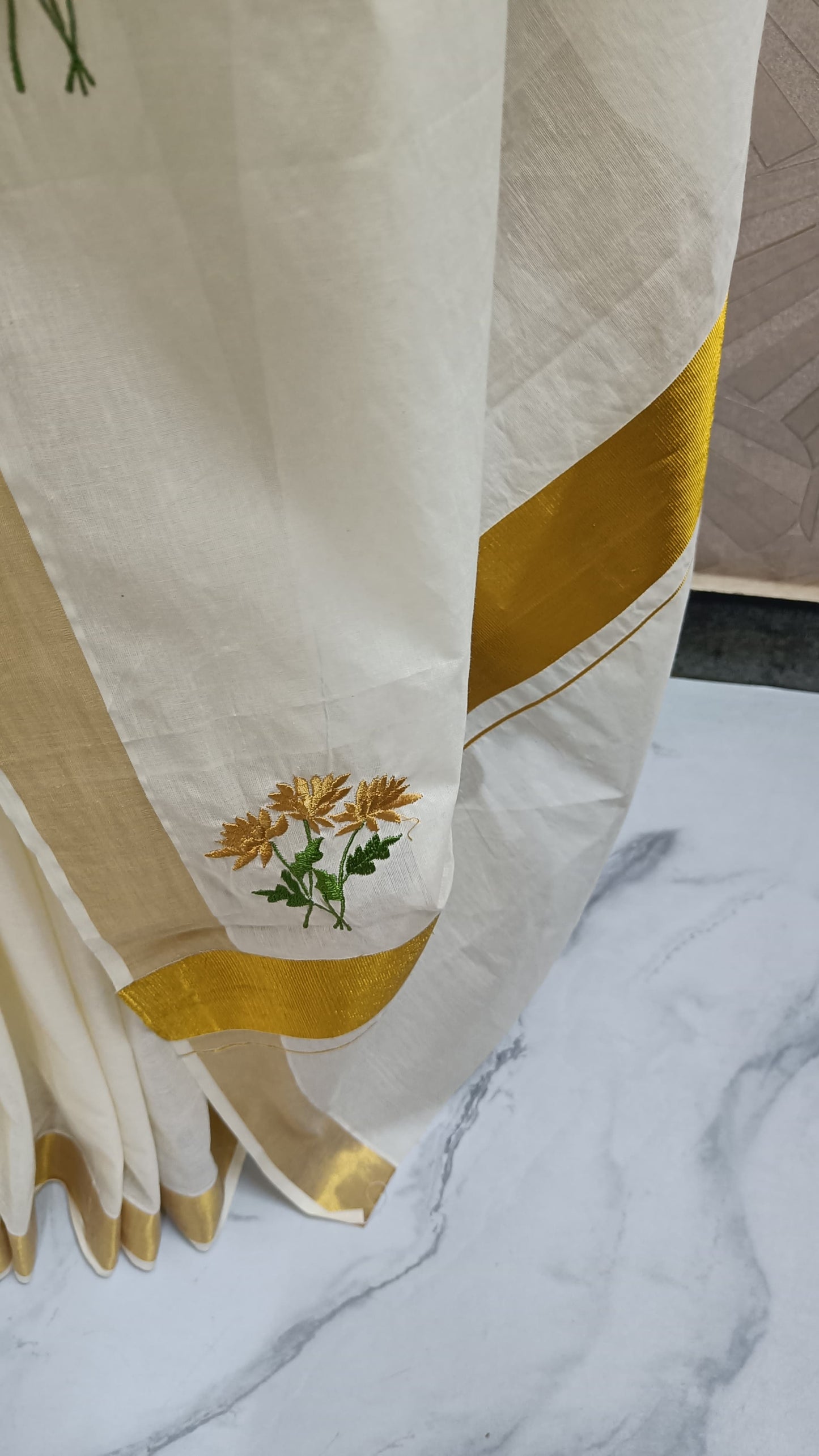 Classic Off-white Cotton Saree with Golden Border & Floral Embroidery