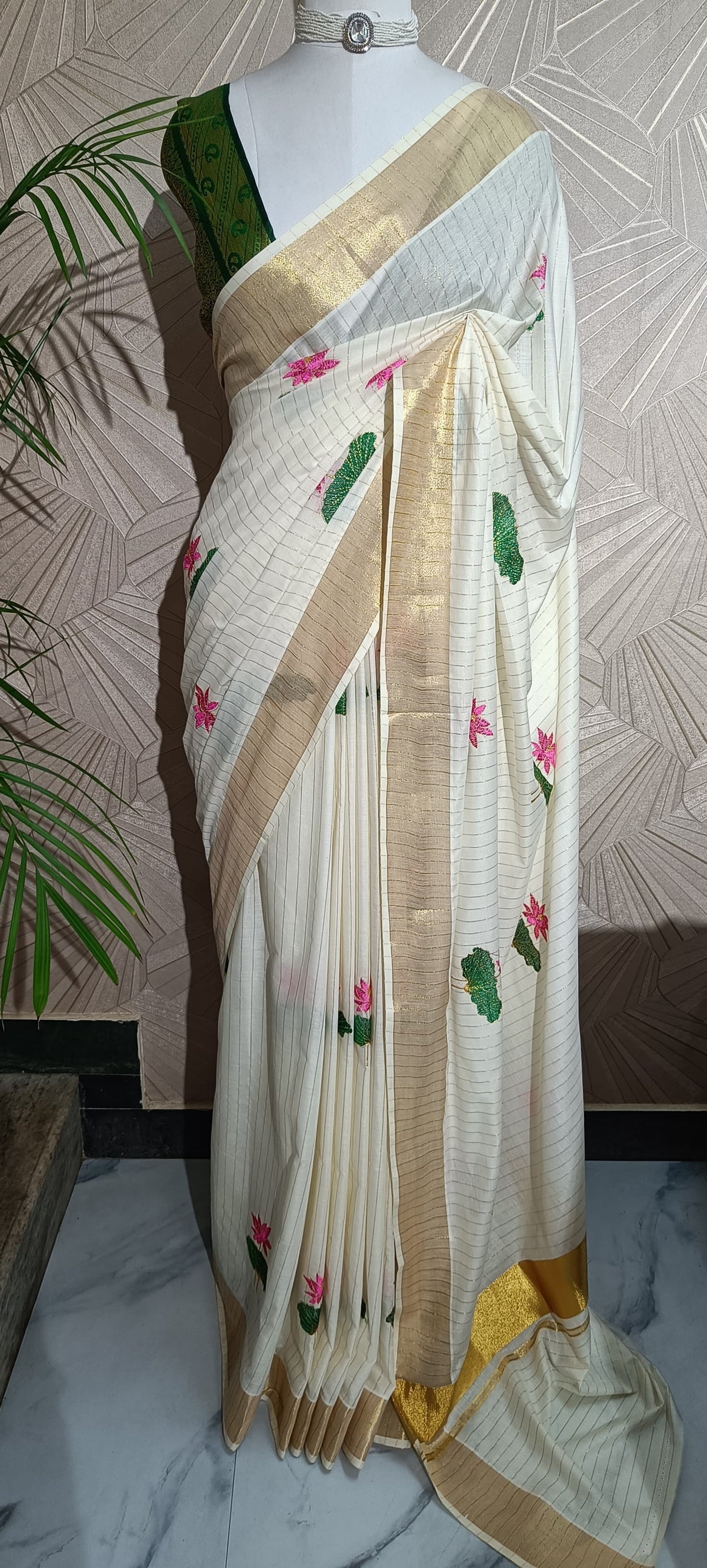 Kerala Kasavu Saree with Lotus Embroidery and Golden Stripes