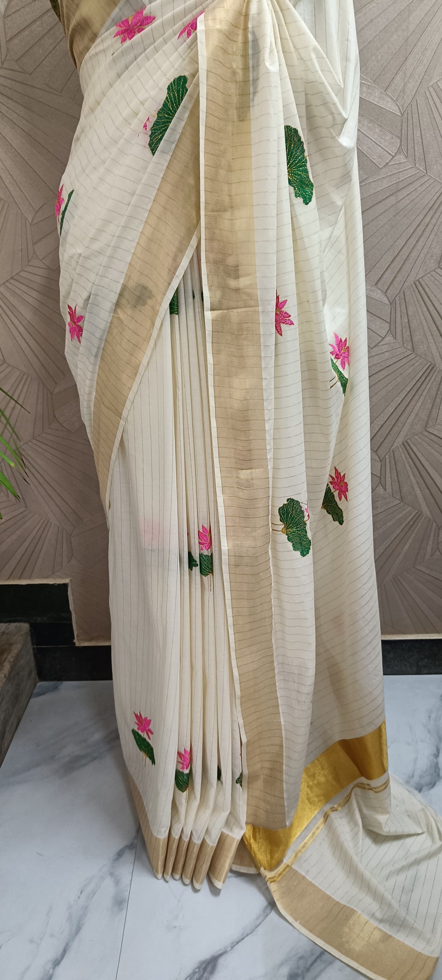 Kerala Kasavu Saree with Lotus Embroidery and Golden Stripes